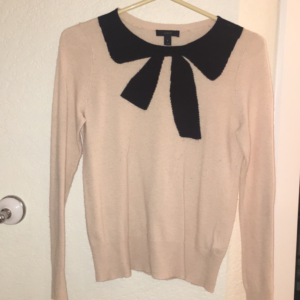 J. crew cream and black bow wool sweater.